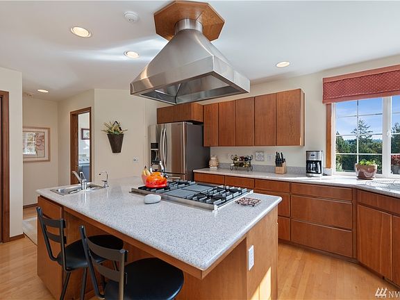 Plenty of counters and generous island space for all your cooking needs.
