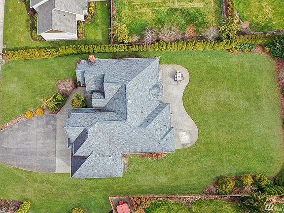 Aerial view of lot shows plenty of room in front & back! Hard to find shy 1/2 acre lot in town!