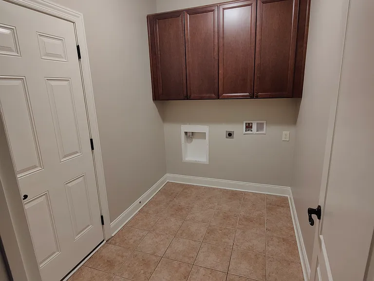 Door from laundry room to garage.