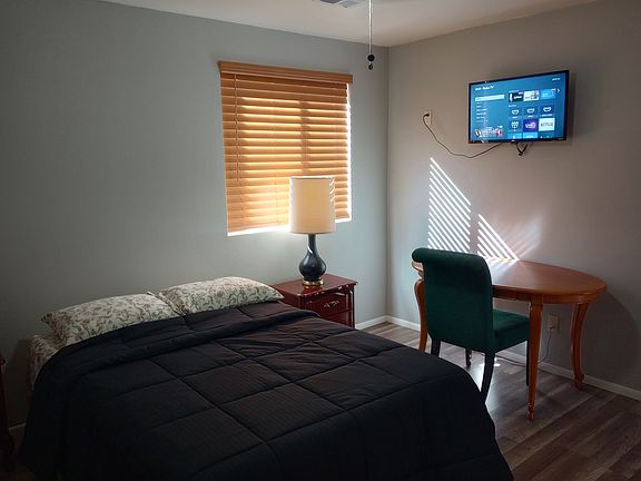 Clean bed room with TV and Closet