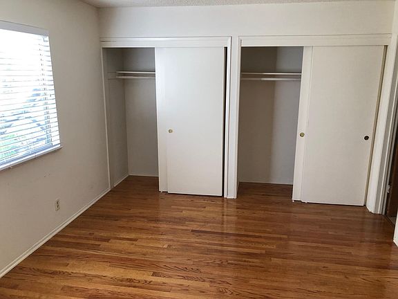 Master bedroom with his & hers closets