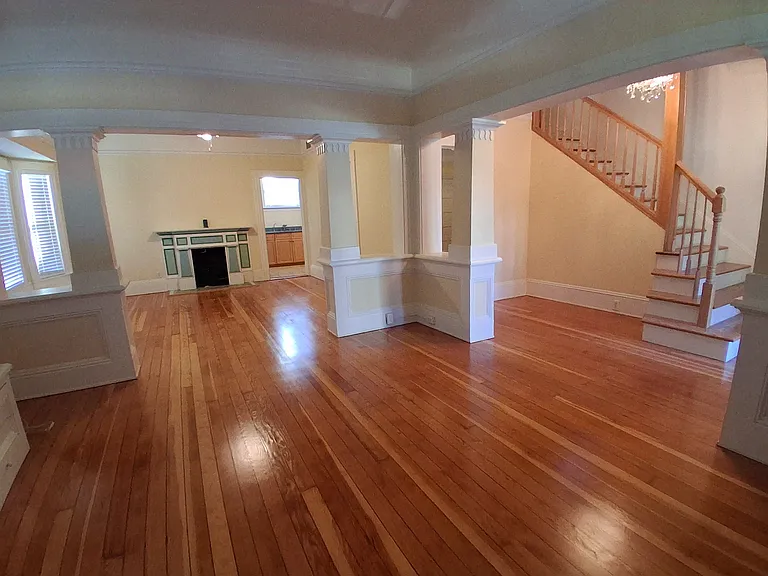 1st Floor - Broad View of Main Room and Stairway