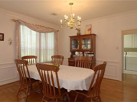  The formal dining room has plenty of space for a good-sized table plus a china cabinet.