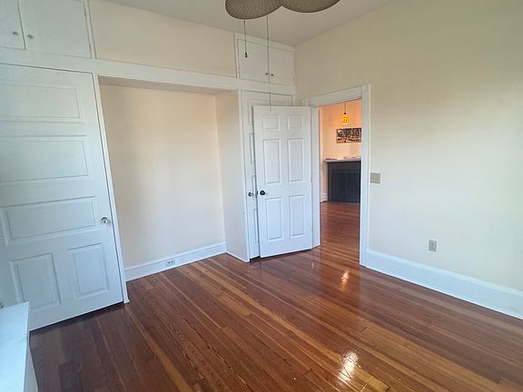 Corner Bedroom facing the door. Closet on the left