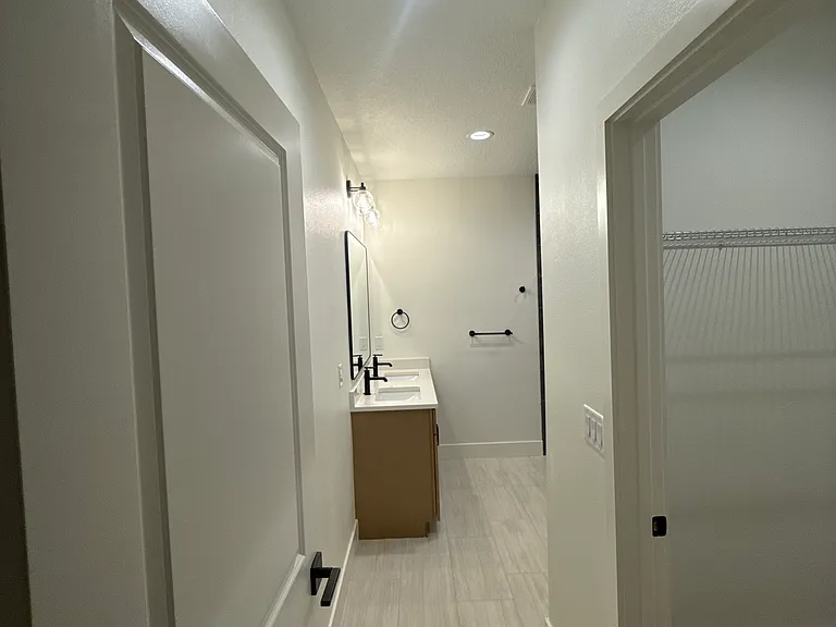 Master bathroom with walk-in closet