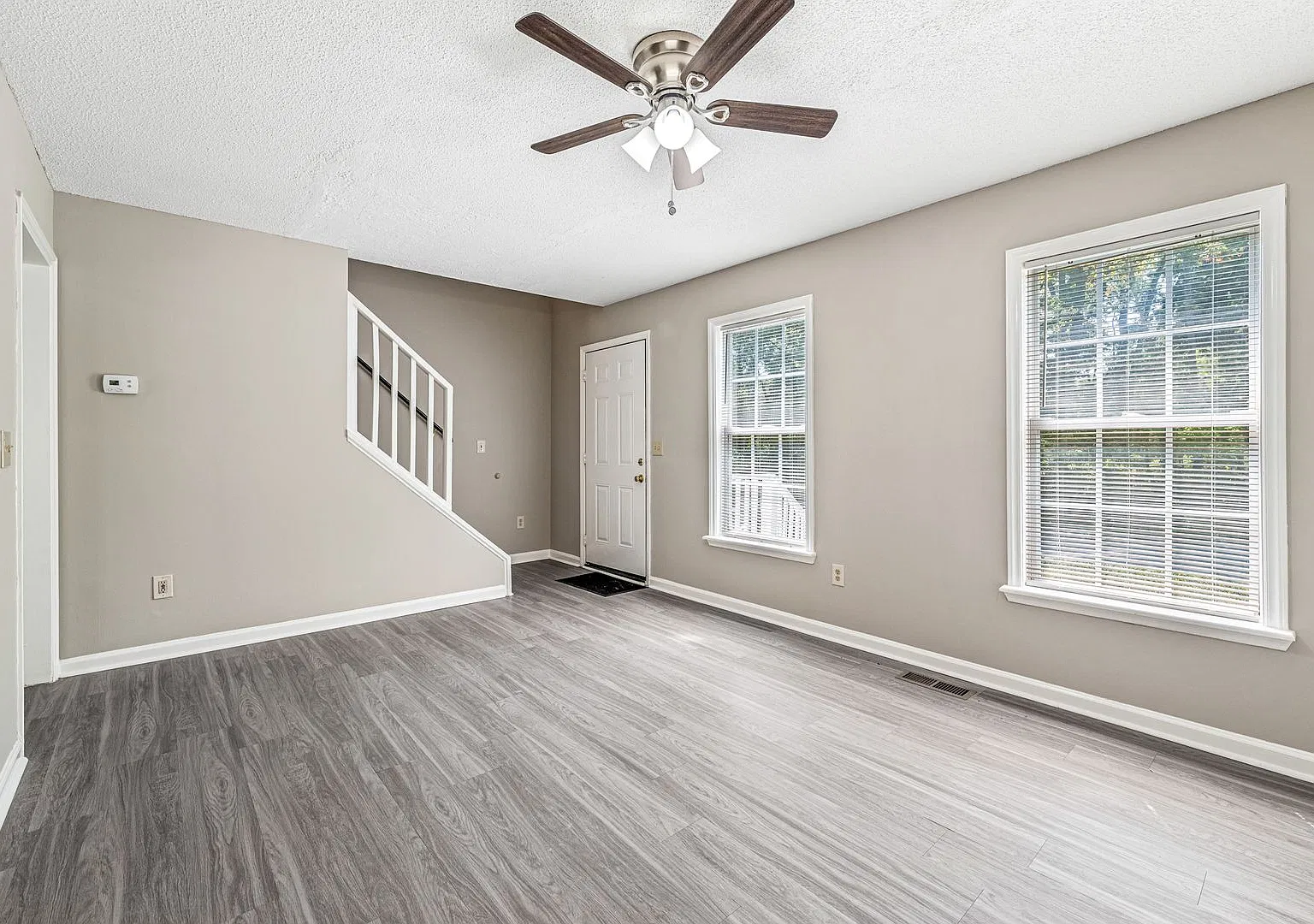 NE Two Story Home, Several Updates, Wood like flooring downstairs, Ceiling Fans, Deck, Must See! — Photo 2