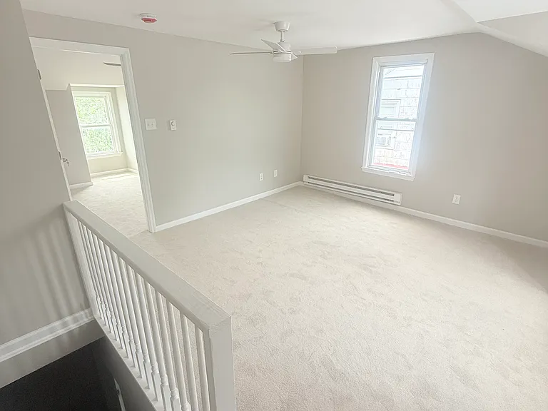 Staircase to Third Floor Looking into 2nd Bedroom