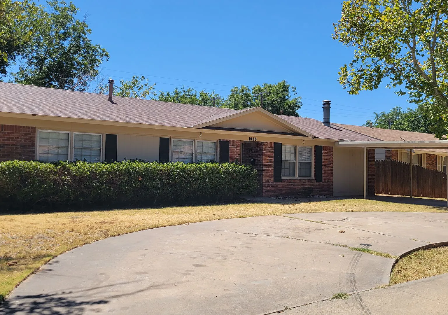 Updated 3-Bedroom Home with Carport and Storage Building — Photo 2