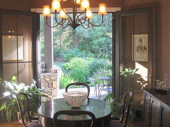 Formal dining or office with doors to water feature