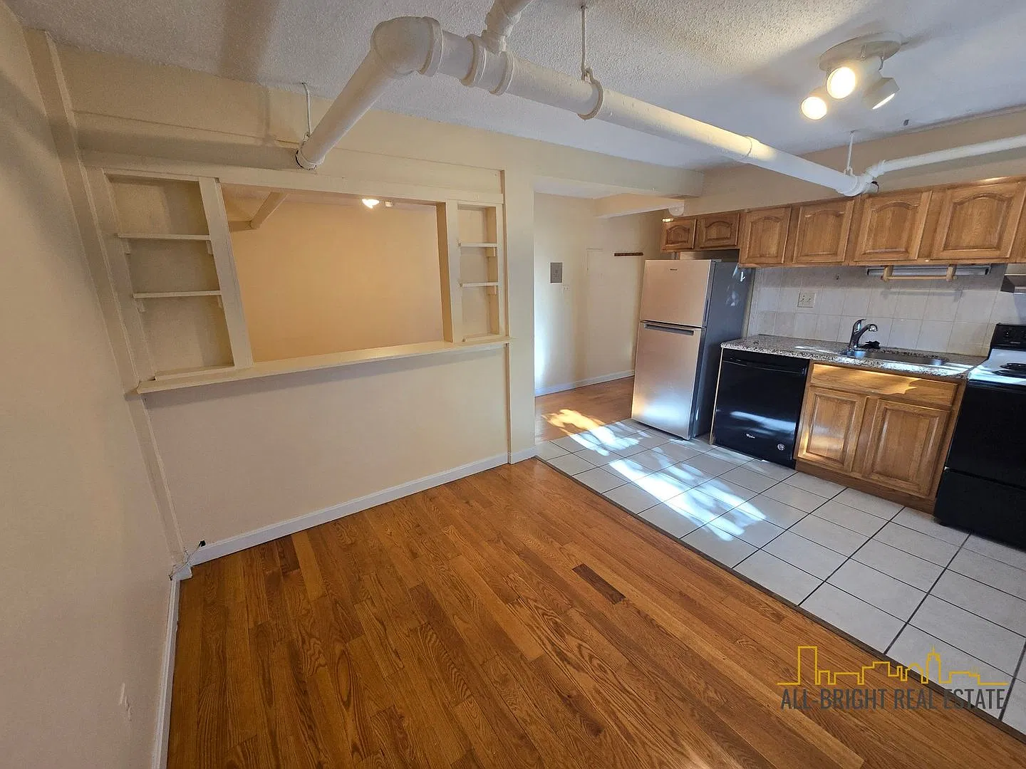 Sunny, Open-Concept One-Bedroom Apartment Available Now! — Photo 2