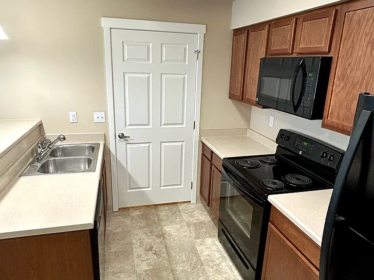 Kitchen with laundry closet