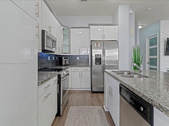 2nd image of 9786 W 34th Ave #0