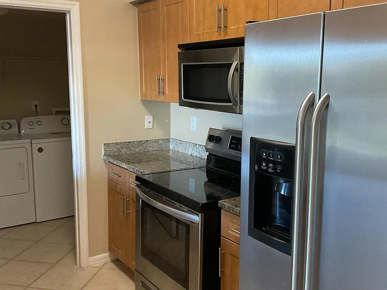 6410 Emerald Dunes Dr #202 — Photo 3