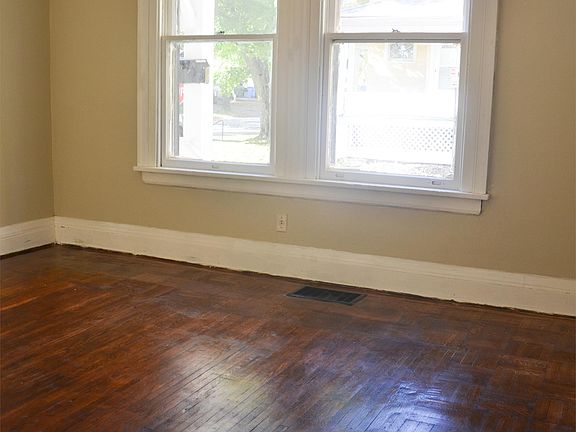 Beautifully refinished parquet flooring