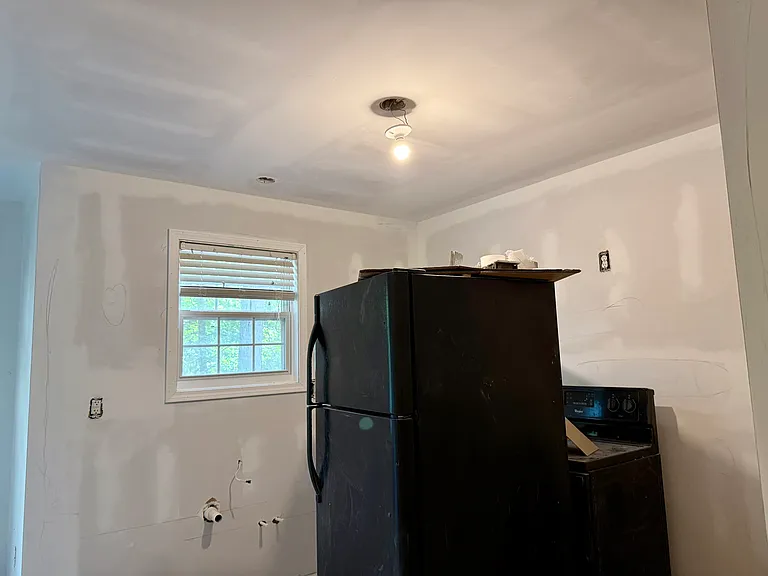 This will be a kitchen again soon. These older appliances will be replaces with sparkling new ones.