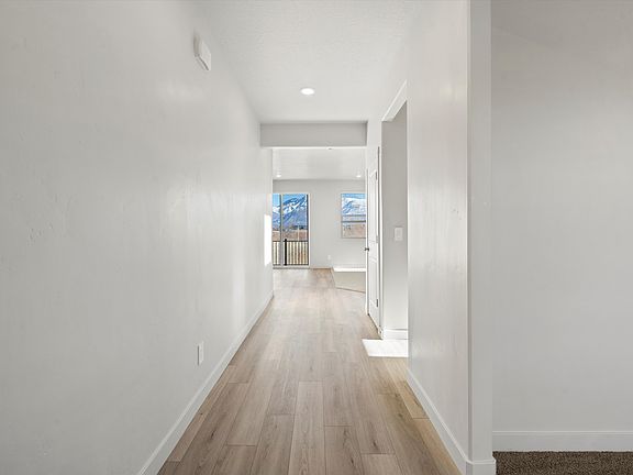 The Residence 5 floorplan interior image taken at a Meritage Homes Community in West Haven, UT.