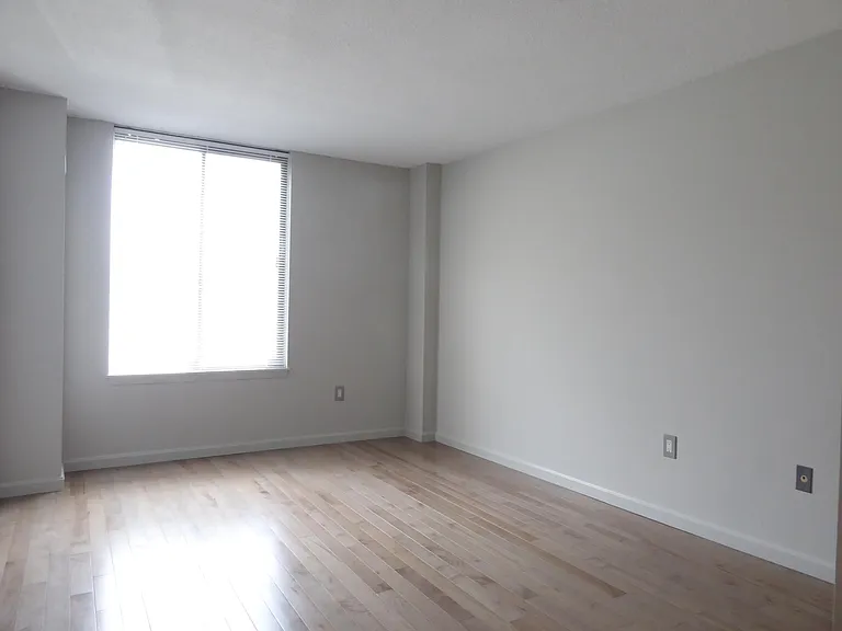 Comfortable bedroom with wide views and large closets.