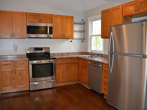 Eat in kitchen with stainless appliances