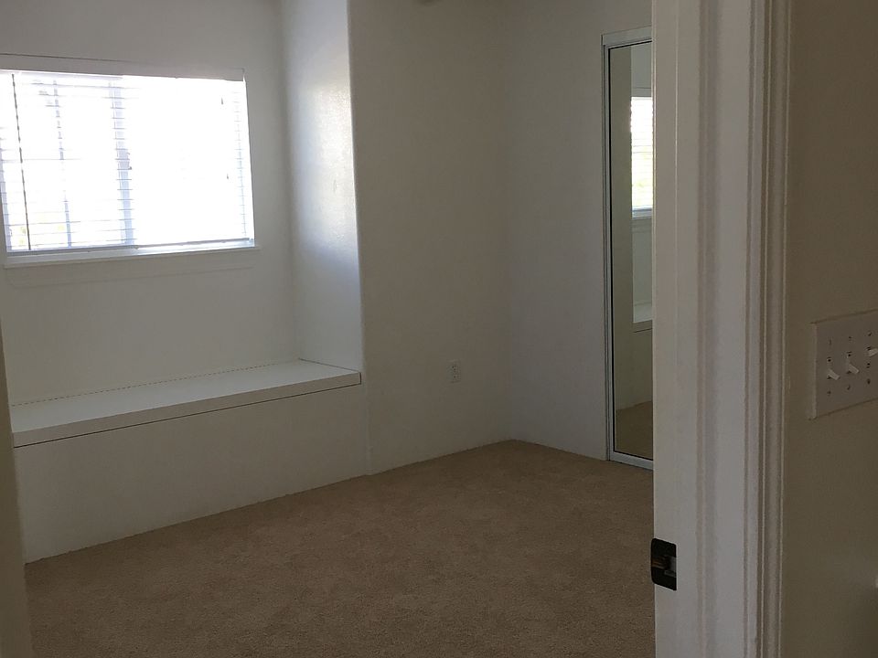 second bedroom with window seat