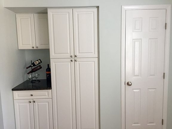 Plenty of storage and wine/coffee bar area