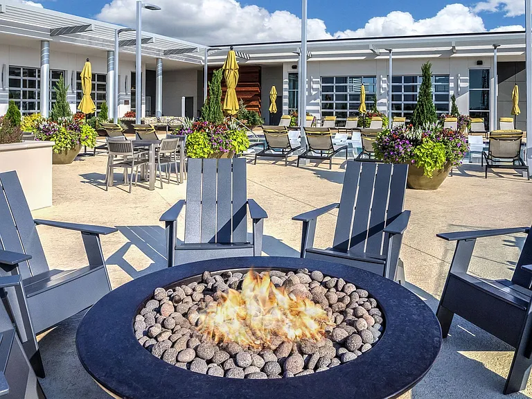 Cozy up by the fire pit with friends and family