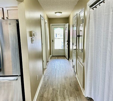 Hallway looking to front entrance