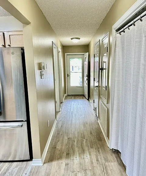Hallway looking to front entrance