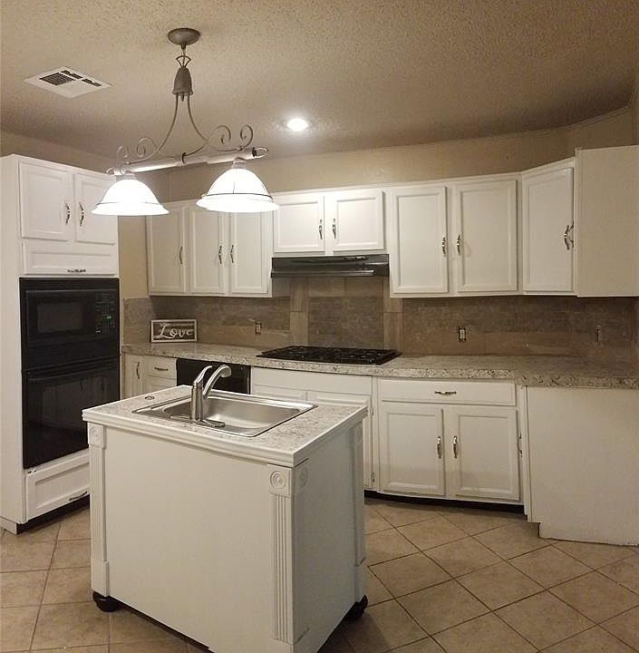 1st image of 213 S 72nd Ave E