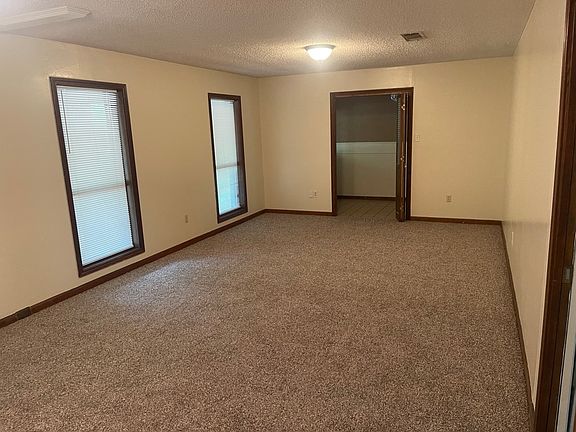 Living room or activity room. Spacious and versatile.