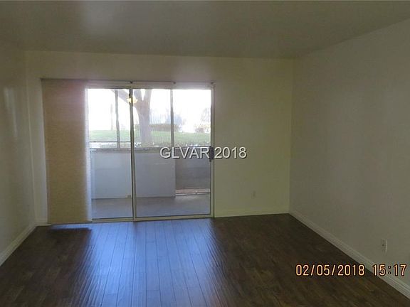 Living Room opens to screened in porch.
