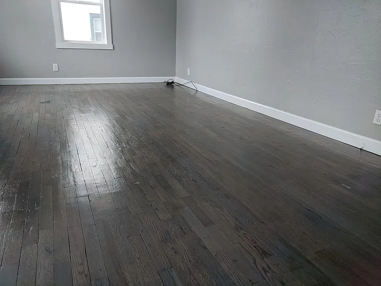 Living room with refinished hardwood floors