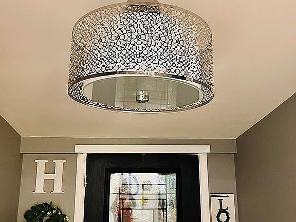 Light fixture in foyer.
