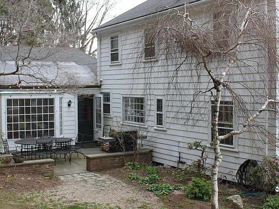 Private patio with addition in back