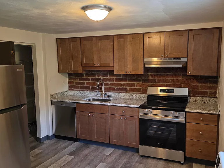 The kitchen has been newly renovated and features all brand-new appliances.