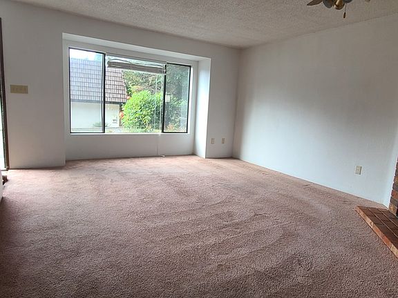 Spacious living room with fireplace