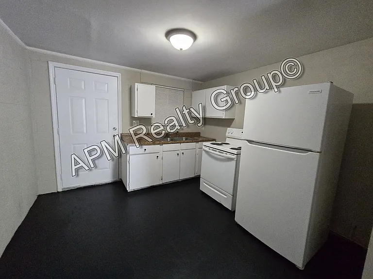 2715A Howell Ave — Photo 1