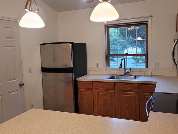 Kitchen area with pantry.