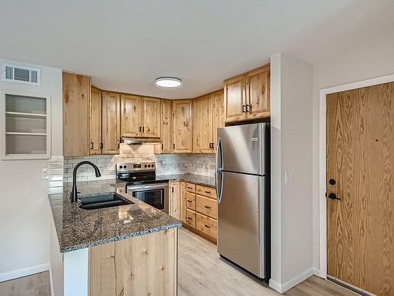 Tons of cabinet space, granite countertops & new appliances