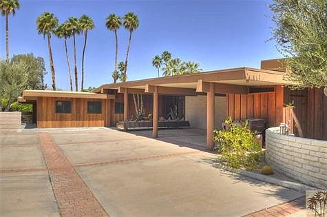 Approaching entry with carports