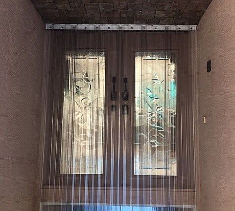 front door with h shutters 
