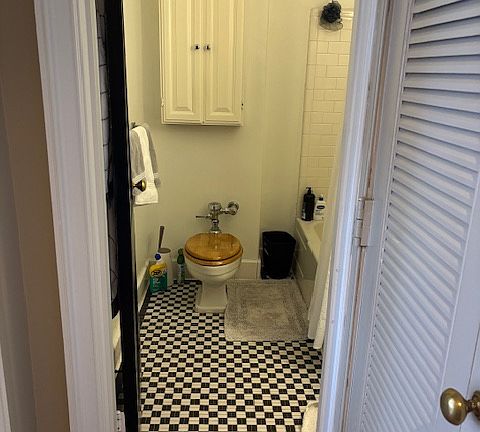 Black and White tile bathroom.