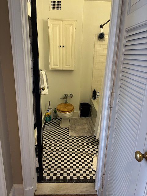 Black and White tile bathroom.