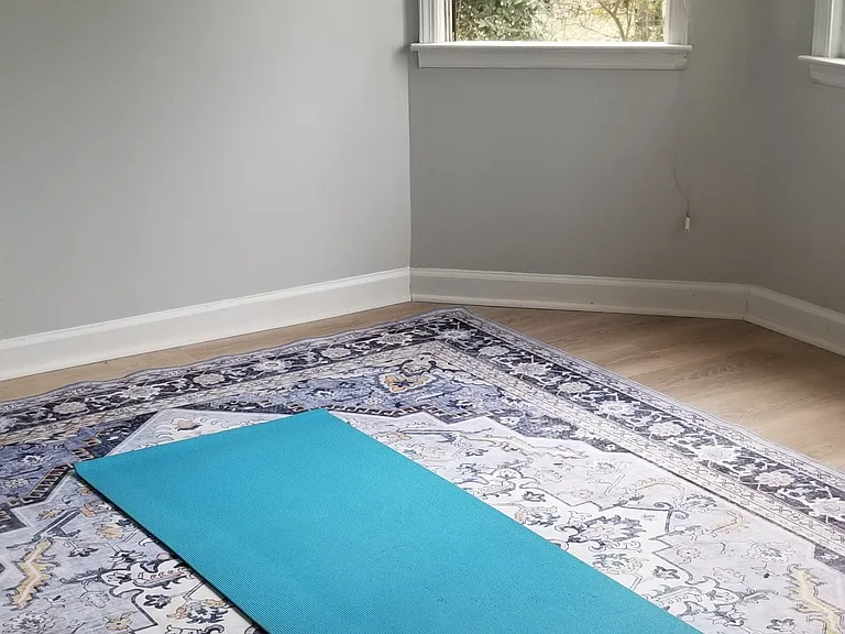 Ample flexible space remains open for a play area or a yoga mat