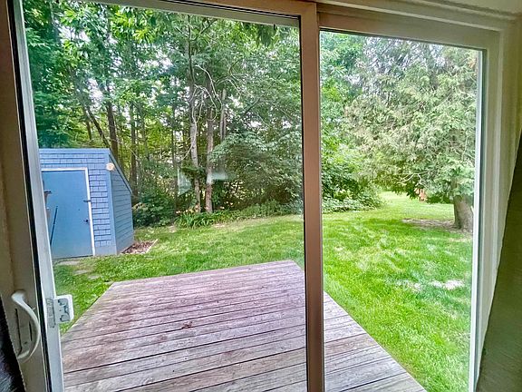 View from Pella Sliding Glass Door to Ground Level Patio