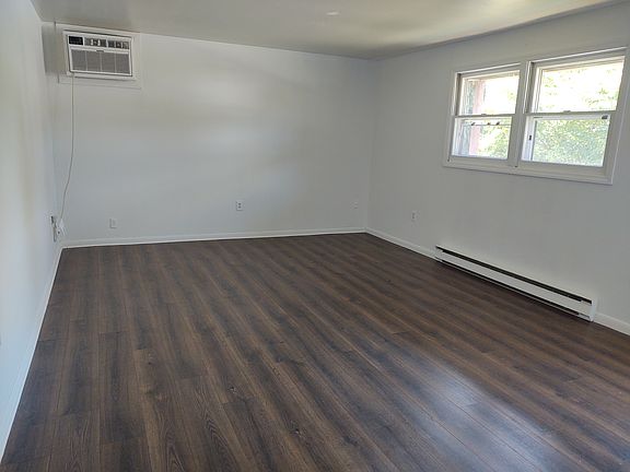 Living room with updated flooring.