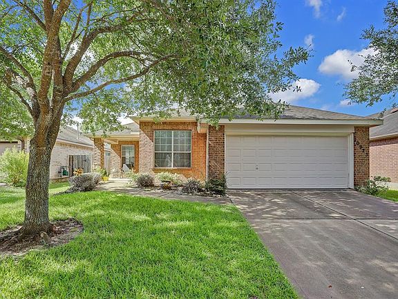 The curb appeal is incredible with a traditional brick elevation, lovely landscaping, and a charming covered front porch.