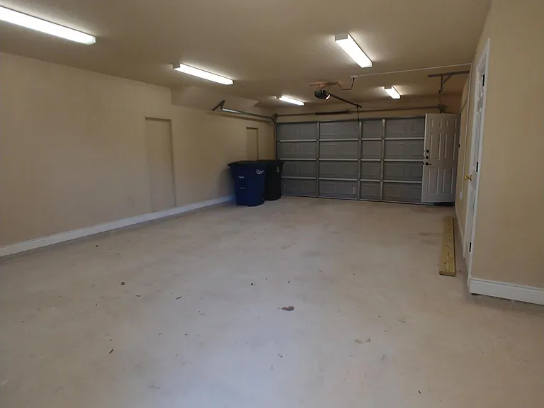 Roomy garage with extra storage closet