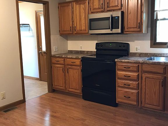Kitchen, with view into laundry room