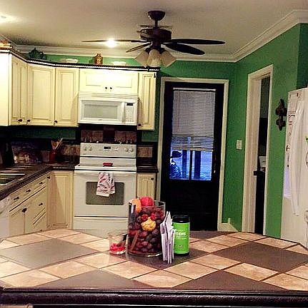 View of kitchen from dining 