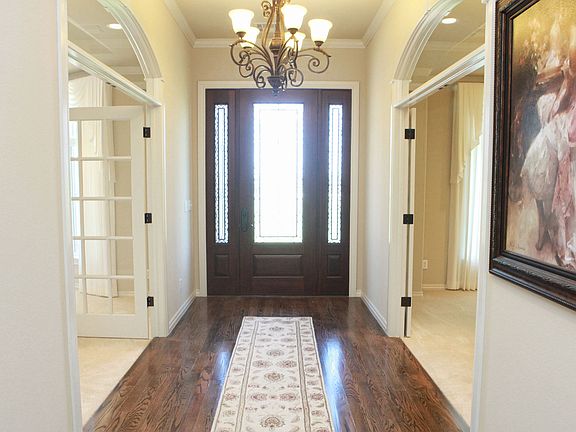 Office on one side and formal dining on the other